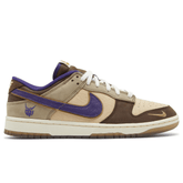 Side view of Nike Dunk Low Premium ‘Setsubun’ sneaker showing suede and gold Swoosh