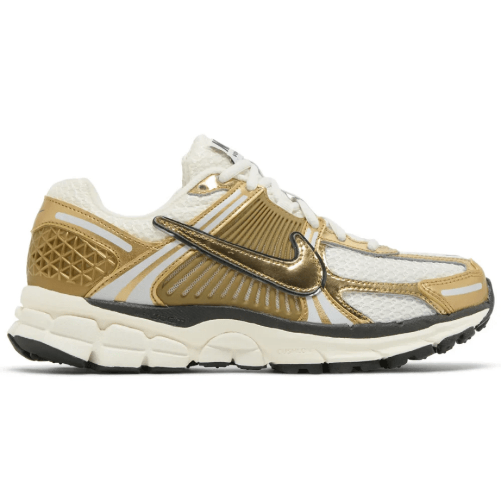 Side view of Nike Air Zoom Vomero 5 ‘Metallic Gold’ sneaker with gold accents