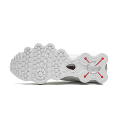 Nike Shox TL "White" worn with streetwear outfit