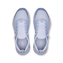 Pair of light blue athletic shoes on a white background