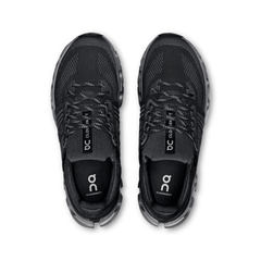 Black running shoes with 'On' branding on a white background
