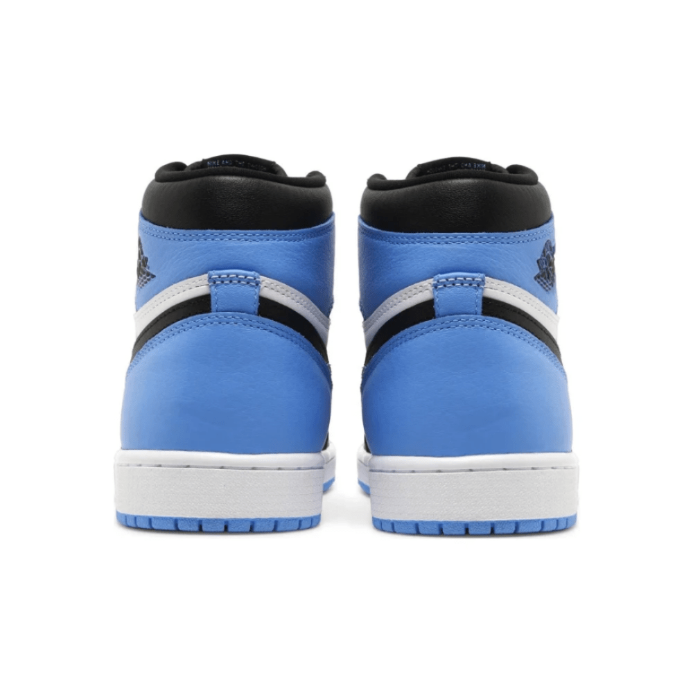Air Jordan 1 Retro High OG 'UNC Toe' styled with jeans