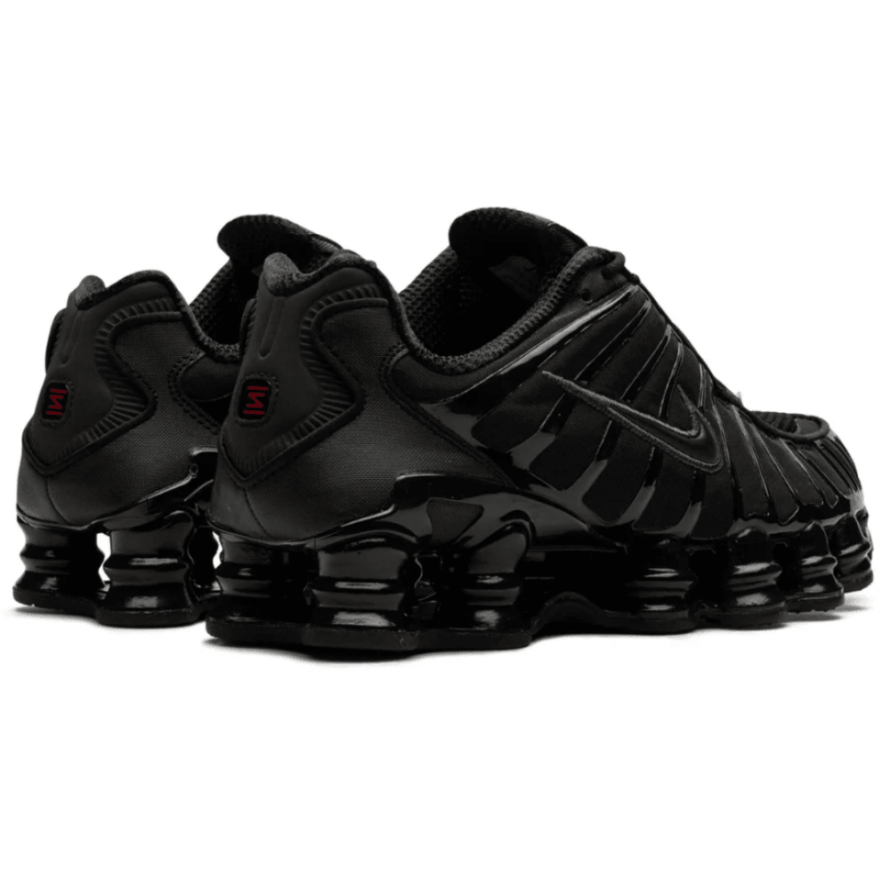 Nike Shox TL "Black Max Orange" worn with casual black outfit