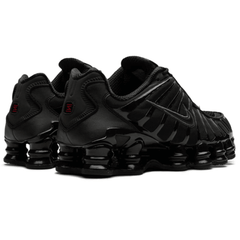 Nike Shox TL "Black Max Orange" worn with casual black outfit