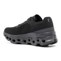 On Running Cloudmonster "Black" on feet Dubai