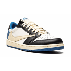 Travis Scott Air Jordan 1 Low OG SP sneakers photographed outdoors in Dubai sunlight